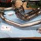 Shiny new exhaust ready to go on.